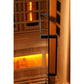 Golden Designs infrared sauna with glass door, black handle, and illuminated interior showing wooden cabin and heated panels 