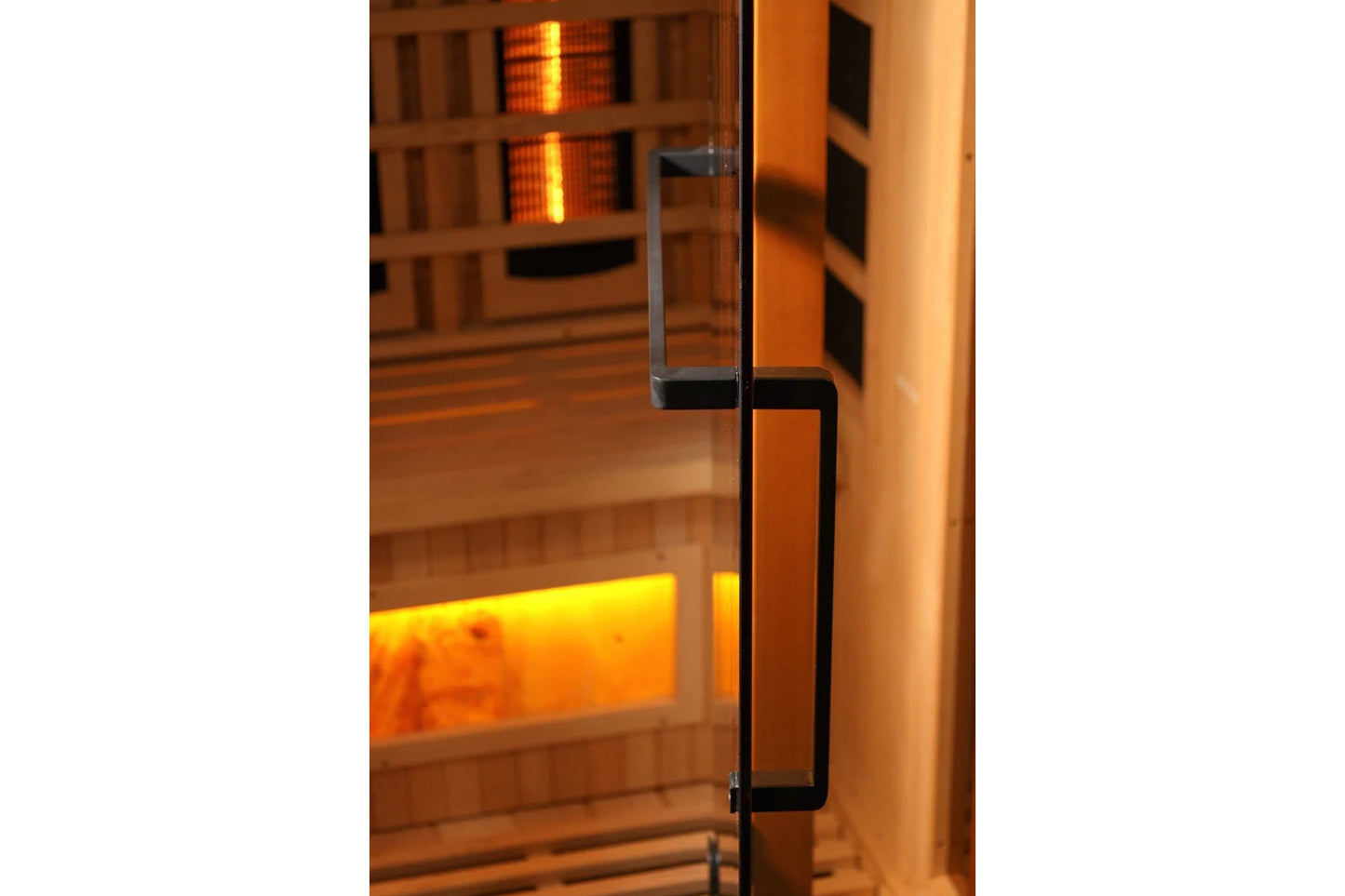 Golden Designs infrared sauna with glass door, black handle, and illuminated interior showing wooden cabin and heated panels 