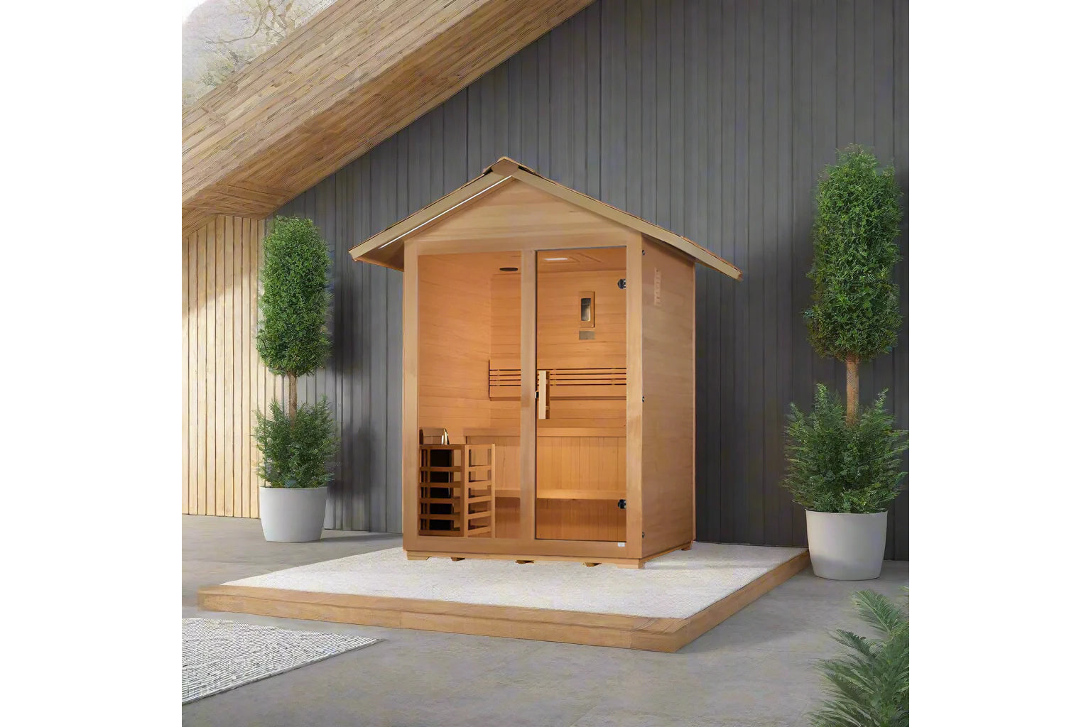 Golden Designs Arlberg cedar wood sauna with pitched roof, double glass doors, and bench seating in outdoor setting with pott