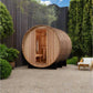 Golden Designs Arosa barrel sauna with light wood exterior and open door showing interior benches, positioned in modern backy