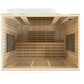 Interior view of wooden infrared sauna with light wood panels, black heater elements on side walls, and slatted bench seating