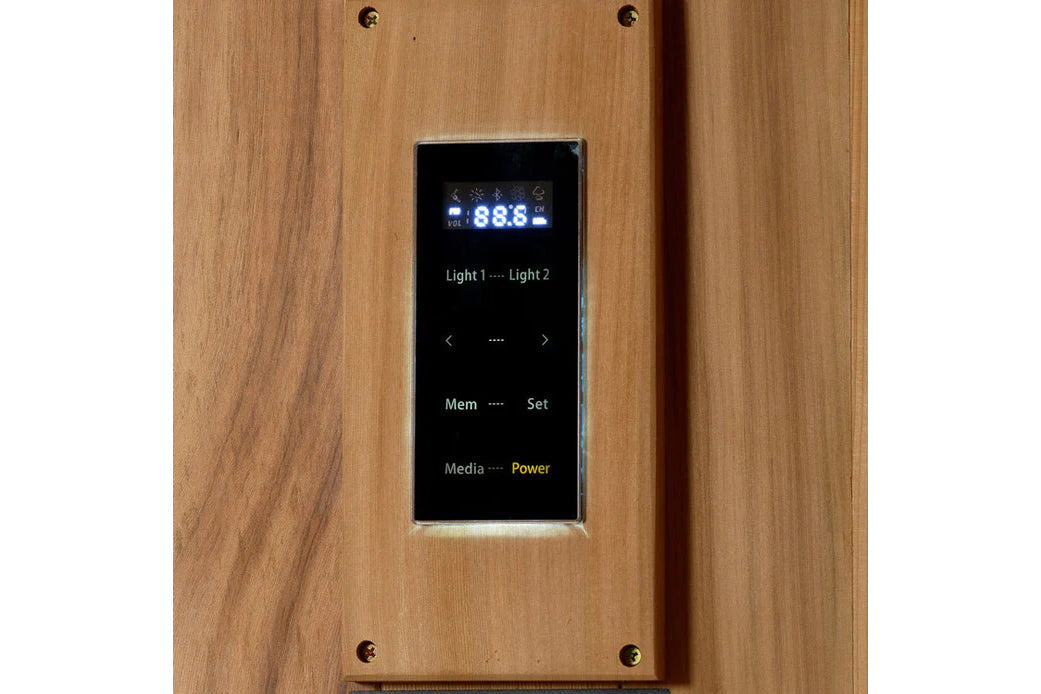 Digital sauna control panel with blue LED display showing temperature, mounted on light wood exterior wall
