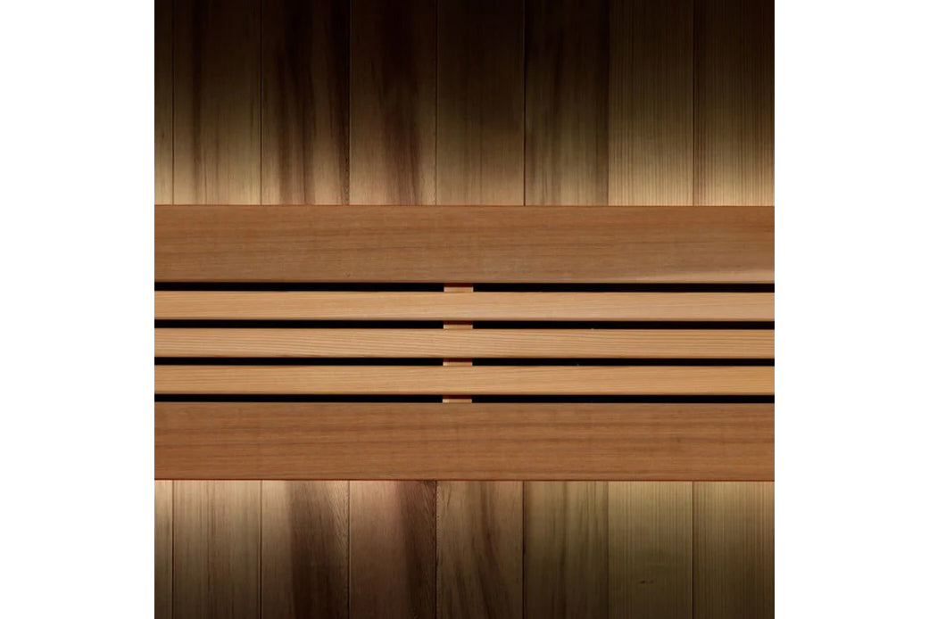 Golden Designs Copenhagen sauna interior showing wooden benches with black metal frames and vertical wood paneling on walls