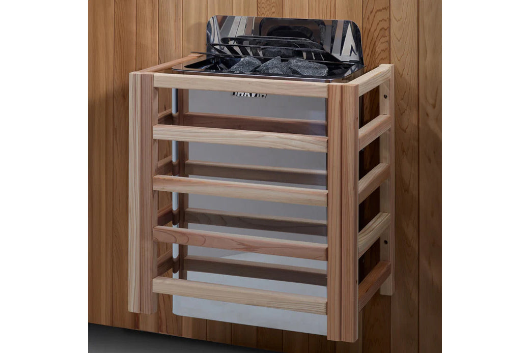 Natural wood sauna with open top lid containing black interior components and folded towels, multiple horizontal wooden shelv