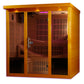 Golden yellow infrared sauna cabin with wood interior, glass doors, and bench seating, viewed against white background