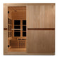 Wooden infrared sauna with light cedar exterior, glass front door with black windows, interior benches, overhead lighting, an