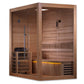 Cedar wood sauna cabin with glass door and interior bench seating, amber lighting, and wooden slat walls on white background