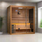 Golden Designs Forssa Edition traditional sauna with light wood frame, glass doors, bench seating, and amber accent lighting 