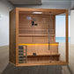 Golden Designs Forssa Edition sauna with cedar wood frame, glass doors, bench seating, and illuminated interior in modern spa