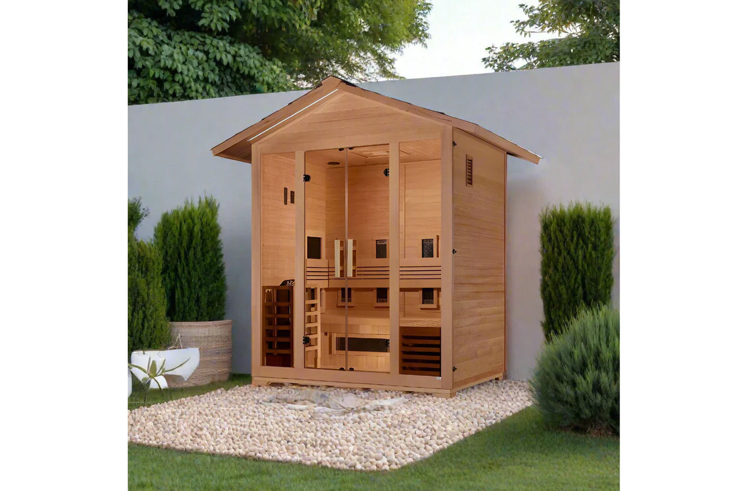 Golden Designs Gargellen outdoor sauna, cedar wood construction with peaked roof and glass front door, positioned in backyard
