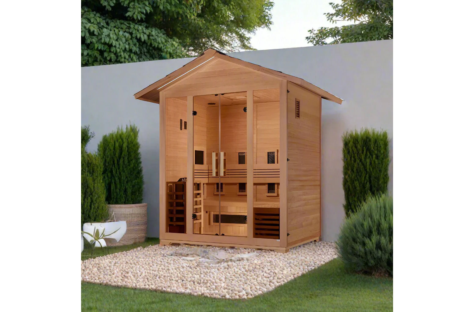 Golden Designs Gargellen outdoor sauna, cedar wood construction with peaked roof and glass front door, positioned in backyard