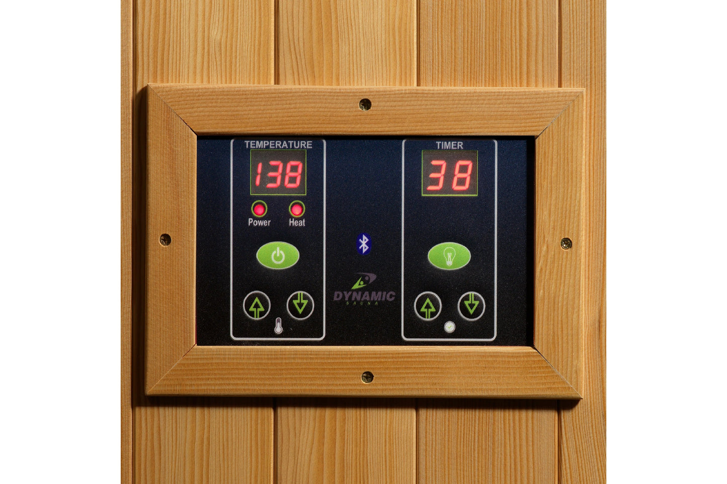 Digital control panel with wooden frame mounted on wood wall, featuring temperature display reading 138, timer display readin