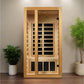 Golden Designs Gracia sauna in light wood with black glass panels, two doors, and infrared heating elements, flanked by potte