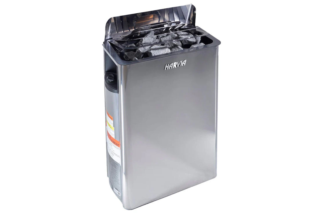 Harvia stainless steel sauna heater with open lid revealing black rocks inside, on white background