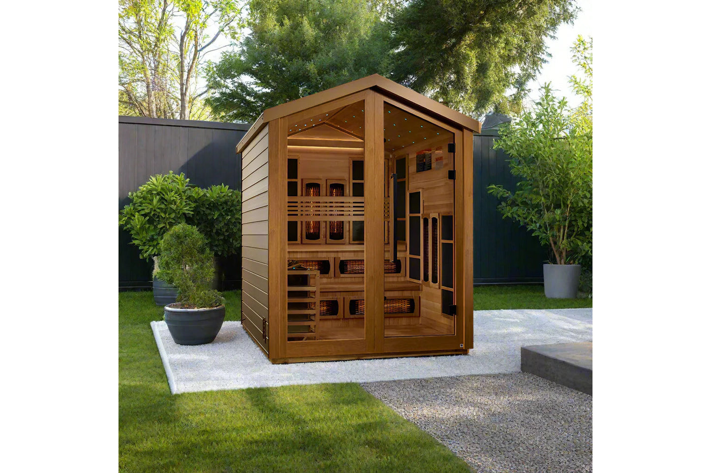 Golden Designs Kaskinen 6-person hybrid sauna with cedarwood exterior and glass doors in backyard setting