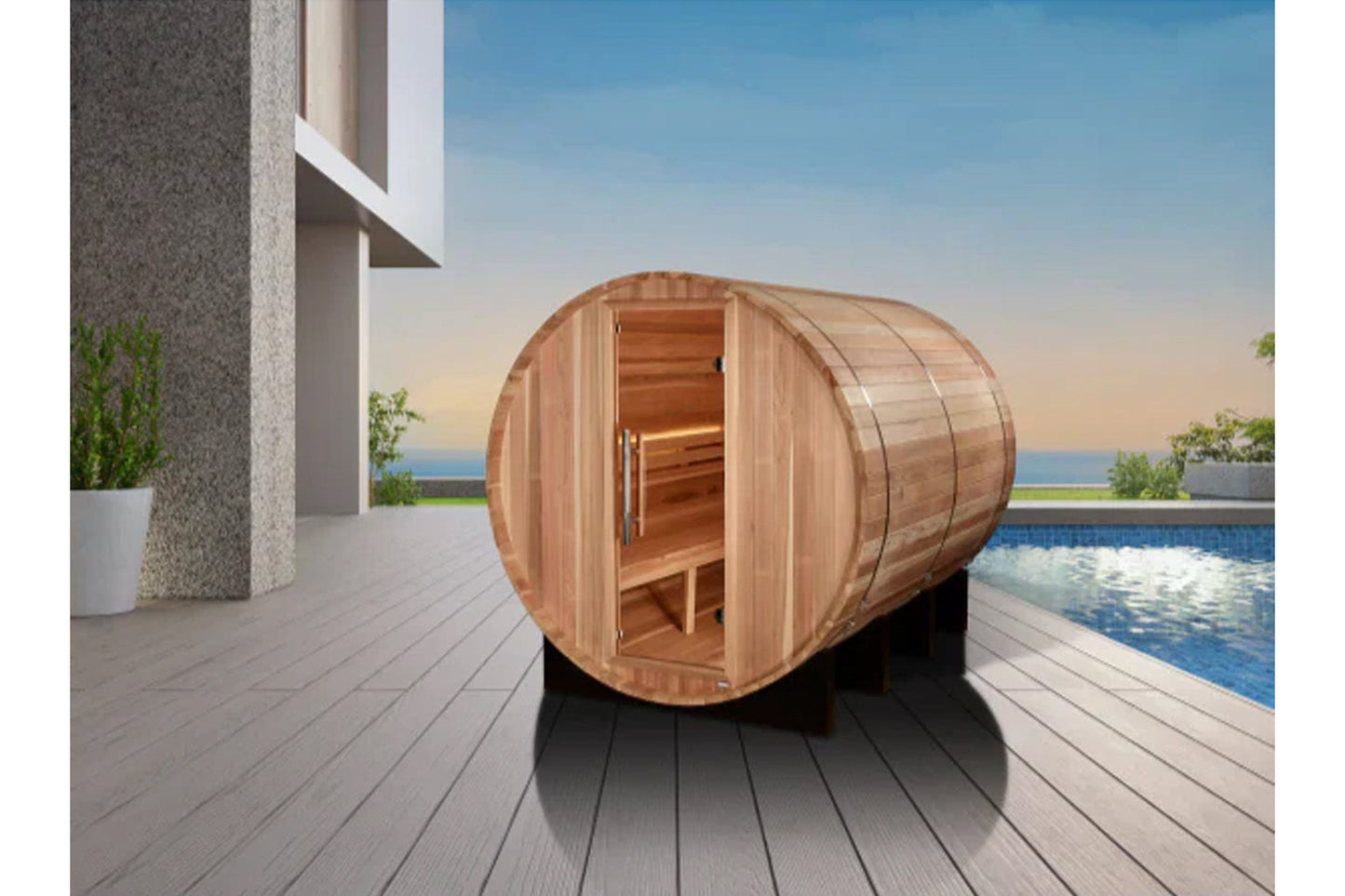 Golden Designs Klosters barrel sauna with cedar wood construction, open door showing wooden benches, positioned on modern dec