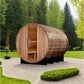 Golden Designs Klosters barrel sauna in red cedar with open door, showing wooden interior benches, in garden setting with eve