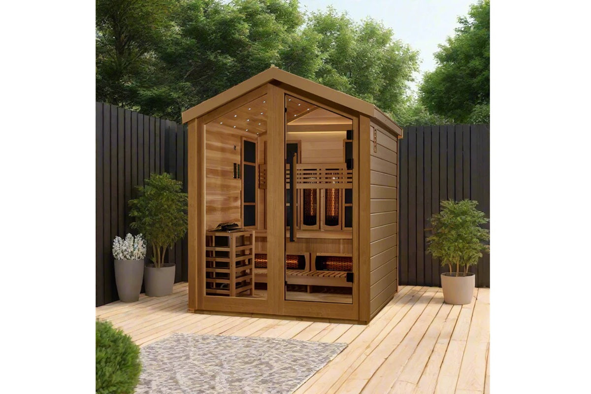 Golden Designs Loviisa sauna with cedar wood construction, glass doors, and heated benches in backyard setting