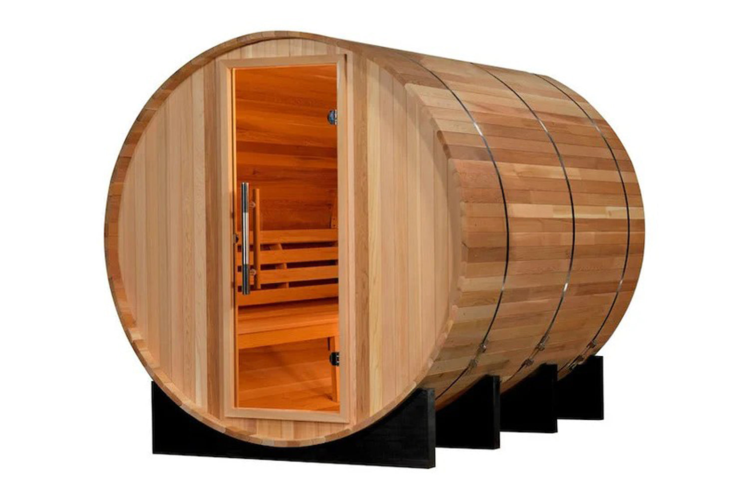 Cylindrical wooden barrel sauna with natural cedar exterior, open door showing orange interior with wooden benches, metal ban