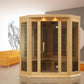 Natural wood corner infrared sauna with glass panels and wooden interior, displayed in modern living room with orange sofa