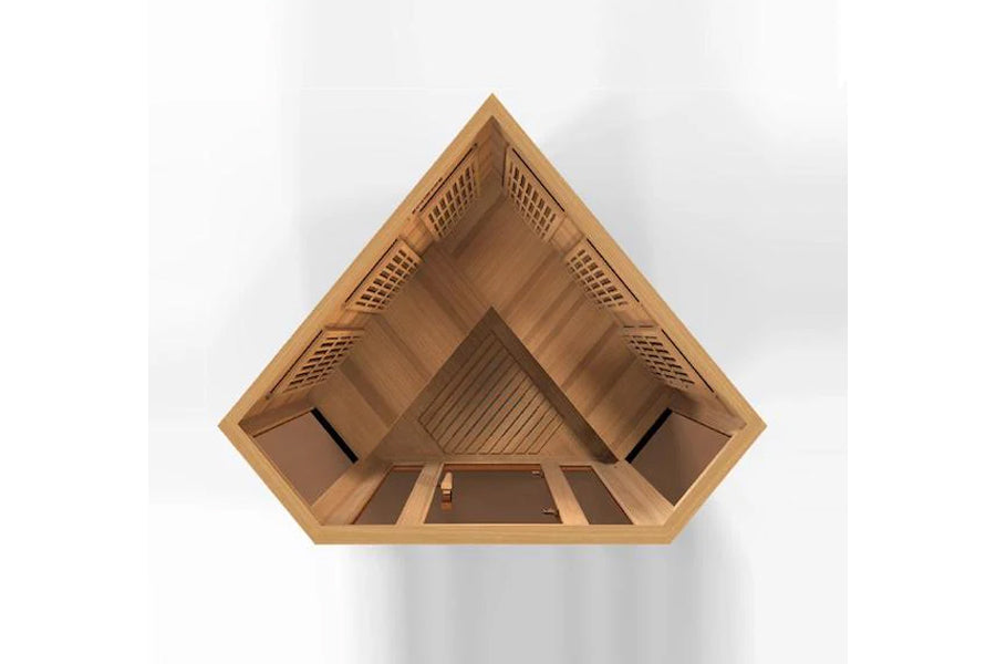 Maxxus 3-person corner sauna with light wood interior, viewed from above showing benches and ventilation grates on white back