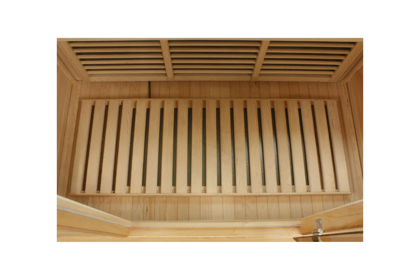 Interior view of wooden sauna showing slatted bench seating and ventilation grille ceiling
