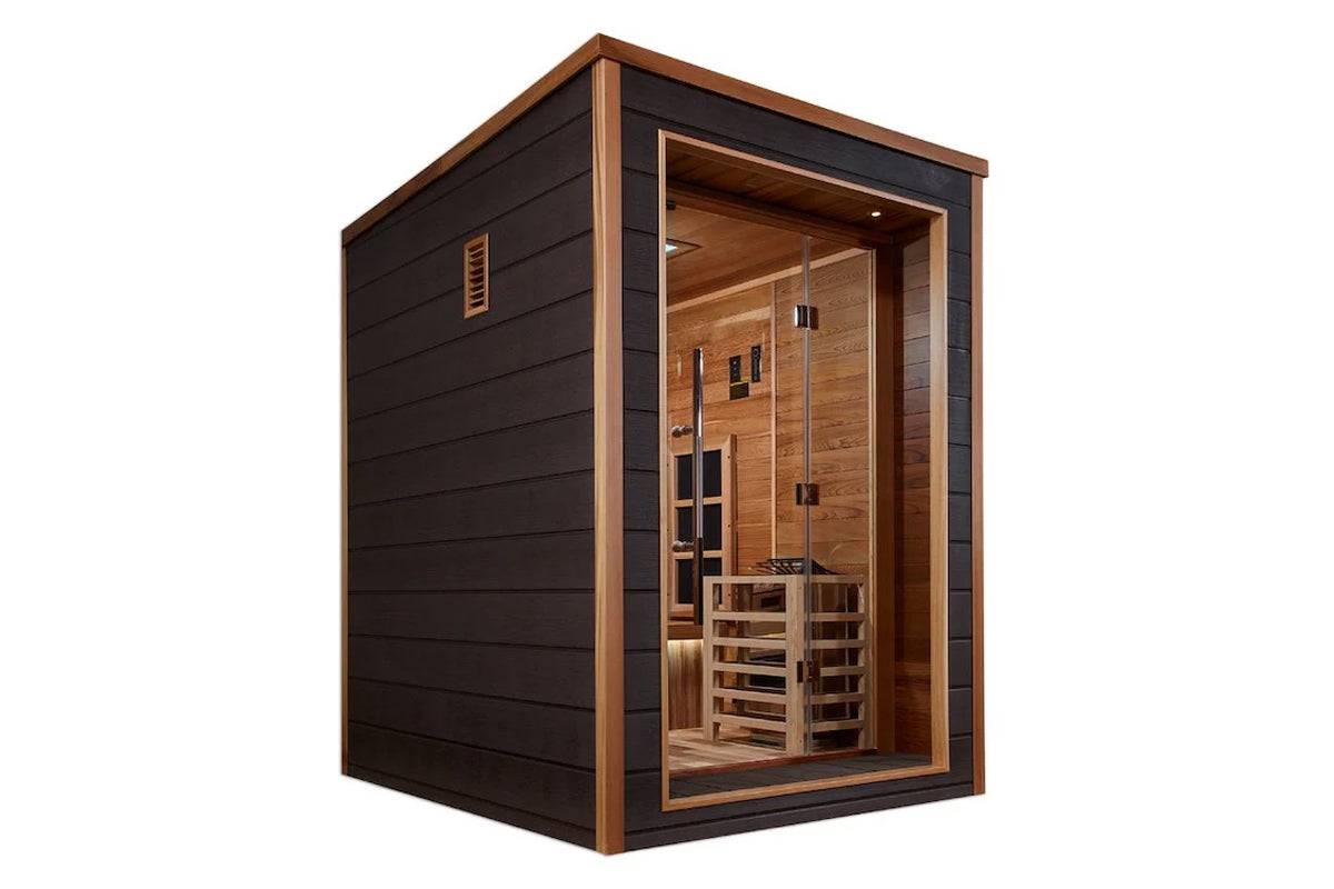 Modern sauna cabin with black exterior walls, wood frame trim, and glass front door revealing natural wood interior with benc