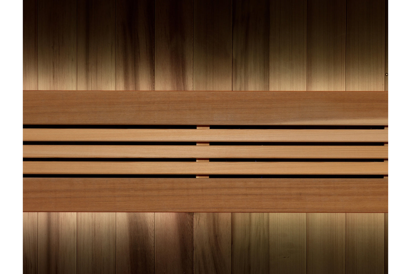 Golden Designs Osla Edition 6-person traditional sauna with light wood interior, vertical paneling, and horizontal bench seat