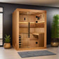 Golden Designs Osla Edition sauna with light wood construction, glass doors, built-in benches, and interior lighting in moder