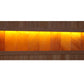 Golden Designs Reserve Edition 3-person infrared sauna with glowing orange Himalayan salt bar window and wood exterior on whi