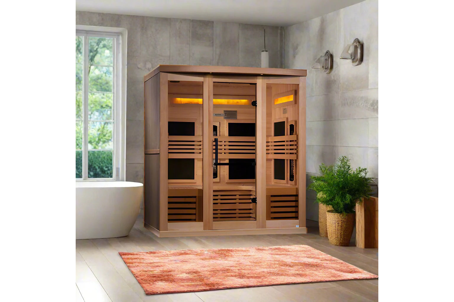 Cedar infrared sauna with three glass doors, amber lighting, and horizontal slat design in modern bathroom setting