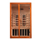 Orange-framed two-person infrared sauna with light wood interior, glass front doors, multiple heating elements, and black ven