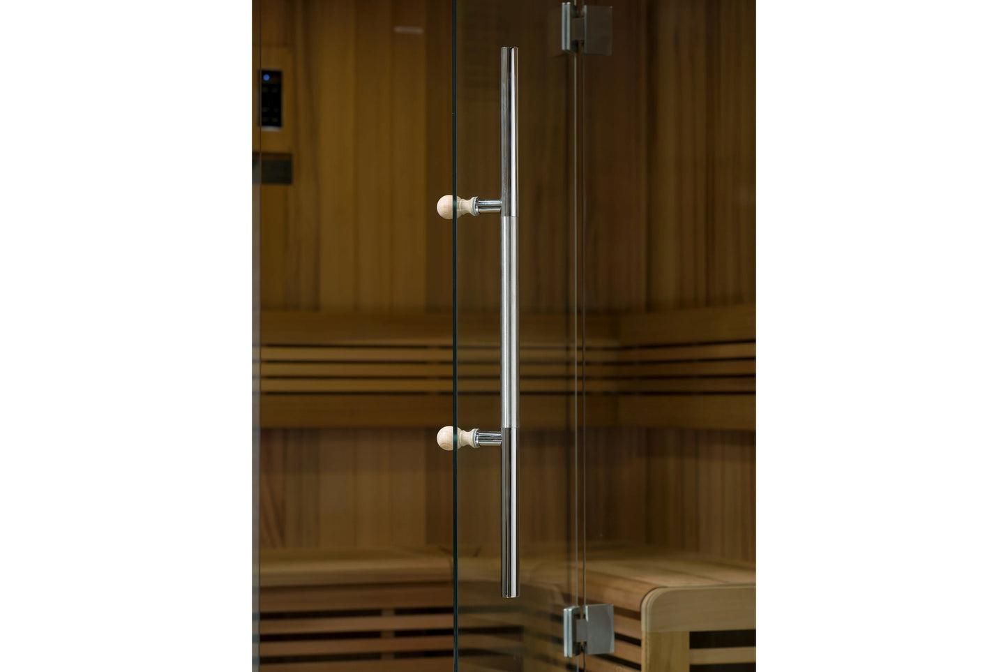 Glass sauna door with chrome handle and pearl knob hardware on wooden sauna cabinet with horizontal slats