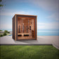 Golden Designs Visby 3-person outdoor sauna with cedar wood interior, glass front doors, and heating panels, positioned on pa