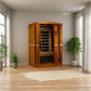 Golden Designs Vittoria 2-person sauna with honey-toned wood exterior, glass doors, and dark interior heater panels in modern