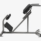 Hammer Strength back extension machine with gray frame, black padded seat and backrest, angled leg press footplate on white b