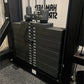 Black Hammer Strength dual pulldown and row machine with numbered weight stack from 10 to 290 pounds, displayed in gym settin