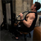 Man using black Hammer Strength dual pulldown/row machine in gym setting