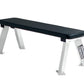 Hammer Strength flat weight bench with black padded seat and white metal frame on white background