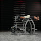 Man using gray and black Hammer Strength glute-ham reverse hyper combo bench machine with loaded weight plates in gym setting