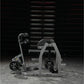 Hammer Strength gray and black glute-ham reverse hyper combo machine with weight plates, in industrial gym setting