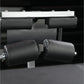 Hammer Strength Glute-Ham Reverse Hyper Combo Bench Machine with black padded leg rollers and silver frame on dark background