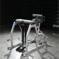 Hammer Strength silver and black glute-ham reverse hyper combo bench machine with padded seat and leg attachment on gray floo