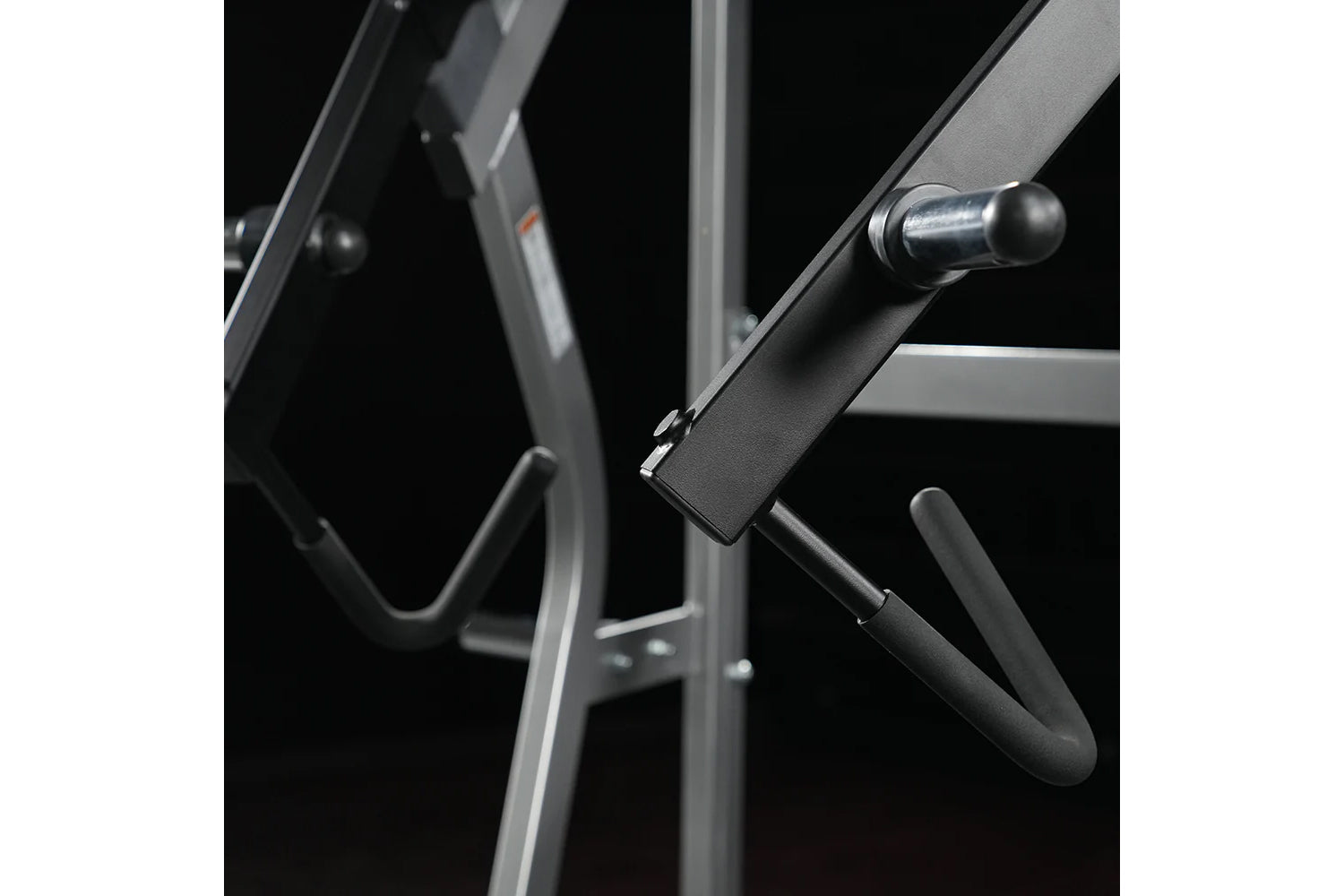 Black and gray Hammer Strength Ground Base Jammer with metal pin and handle detail against dark background