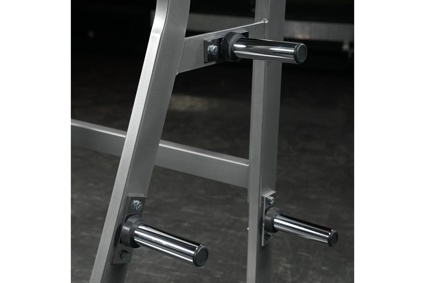 Hammer Strength Ground Base Jammer with silver aluminum frame and chrome handles on dark background