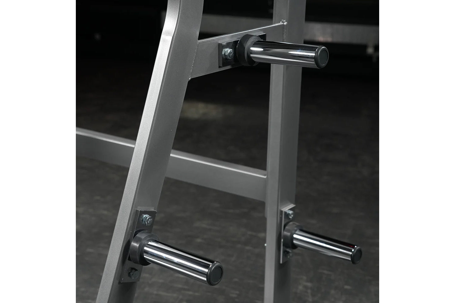 Hammer Strength Ground Base Jammer with silver aluminum frame and chrome handles on dark background