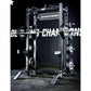 Hammer Strength HD Athletic NX Half Rack with black steel frame, loaded weight plates on barbell, on concrete floor
