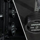 Hammer Strength HD Athletic NX half rack with 45-pound weight plates loaded on bar, black steel construction on dark backgrou