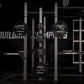Hammer Strength HD Athletic NX Power Half Combo Rack with black weight plates loaded on vertical bar, industrial steel frame 