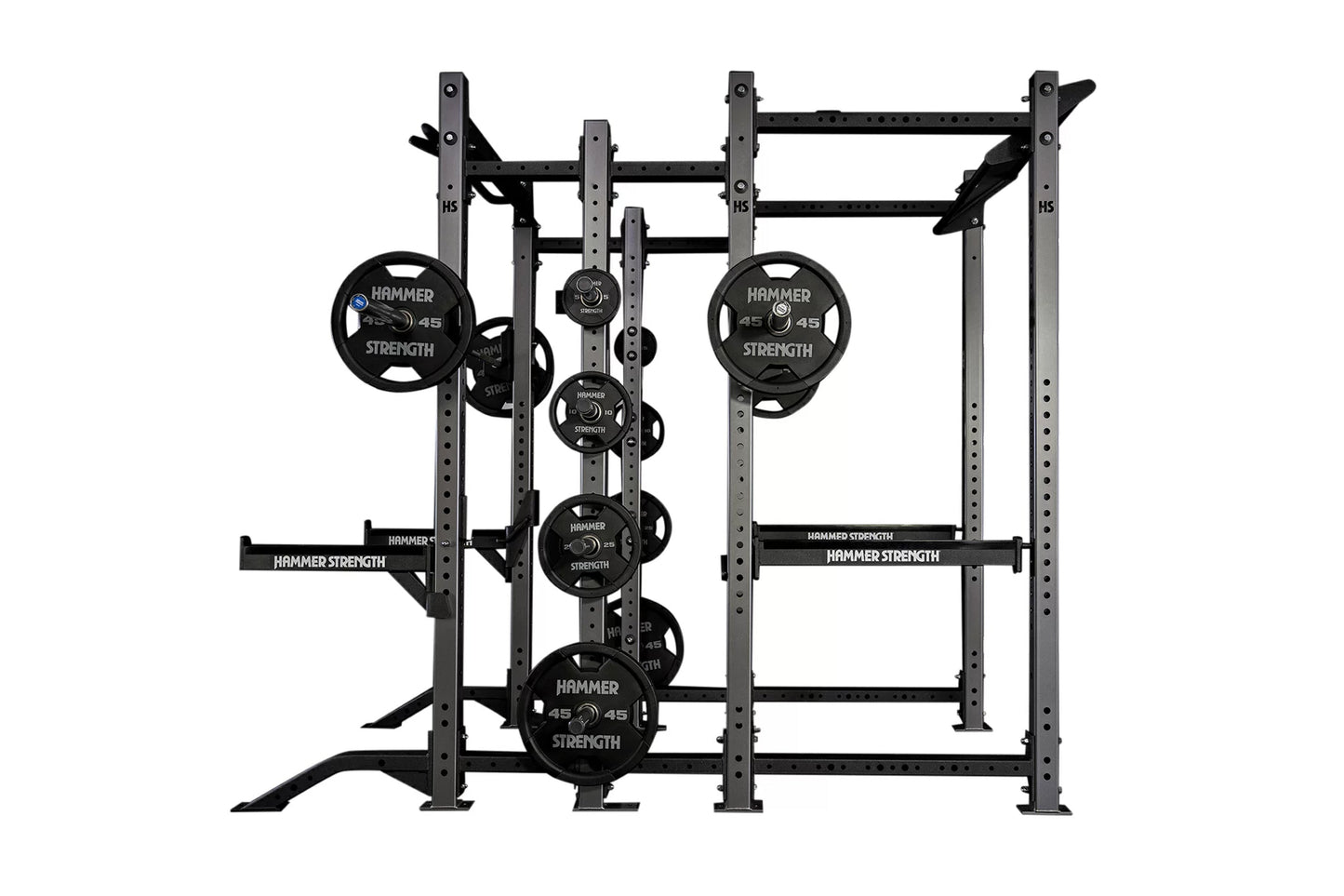 Hammer Strength HD Athletic NX Power Half Combo Rack with black weight plates loaded on multiple bars, gray steel frame on wh